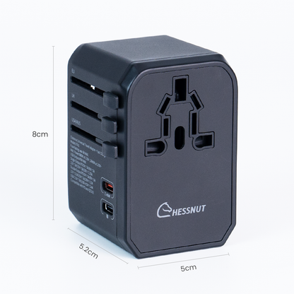Chessnut 45W GaN travel adapter with retractable USB-C cable charging 5 devices simultaneously: chessboard, tablet, phone, and laptop