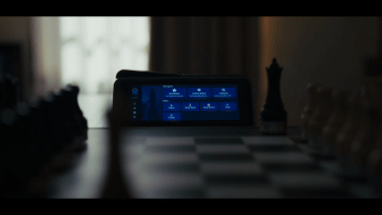 Chessnut Companion connected to a smart chessboard during a live chess game