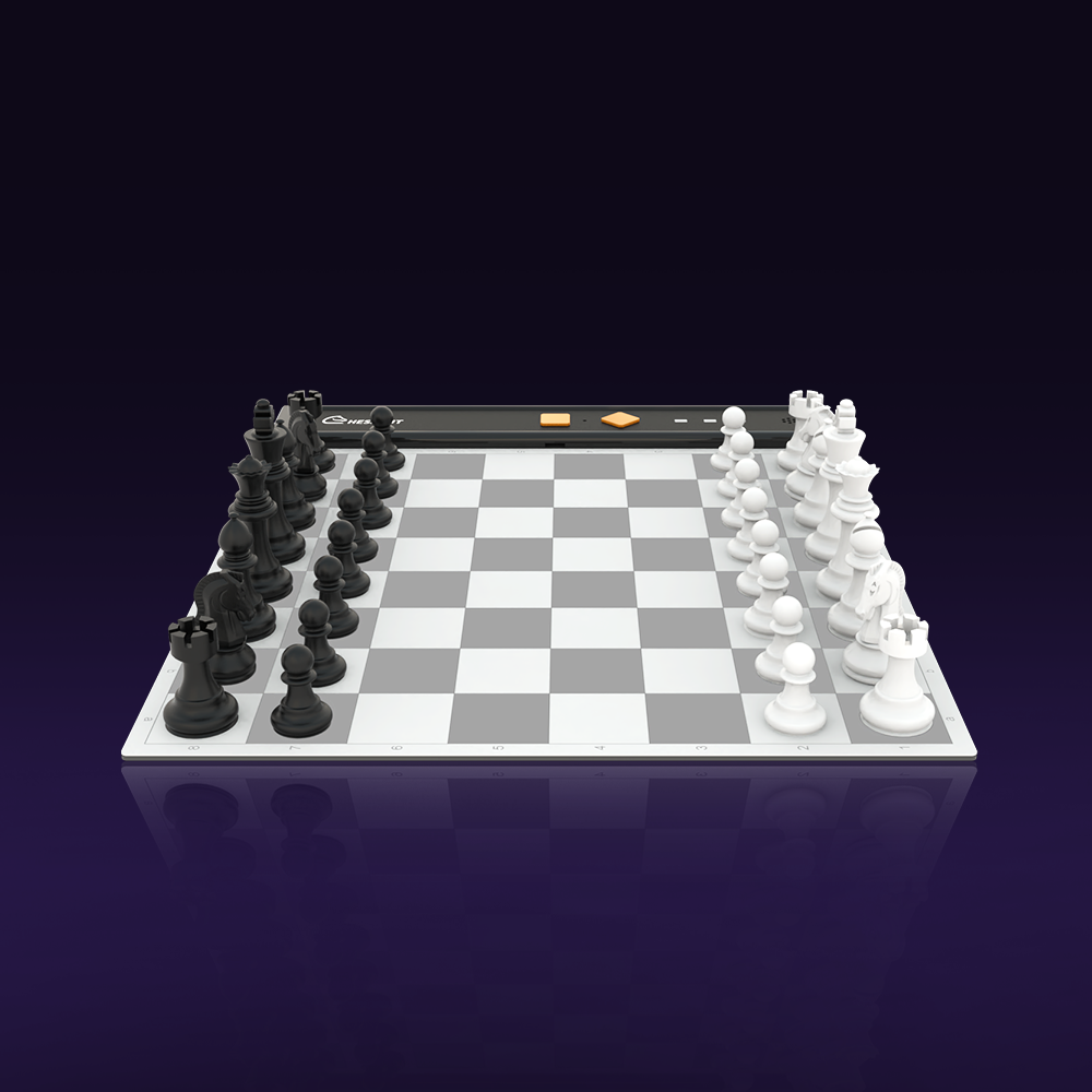 Portable electronic chess board featuring black and white chess pieces arranged on a sleek playing surface.
