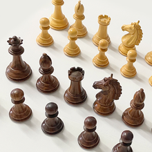 Chessnut Pro premium wooden king and queen wooden chess pieces close-up detail
