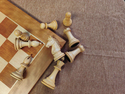 	
Chessnut Pro with premium wooden chess pieces featuring built-in RFID chips for instant recognition